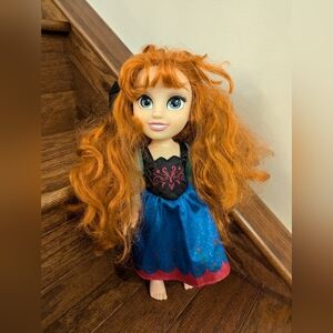 Disney Frozen Anna Doll with posable legs and arms.